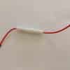 Mikró biztosíték házzal 5KV 0,6A